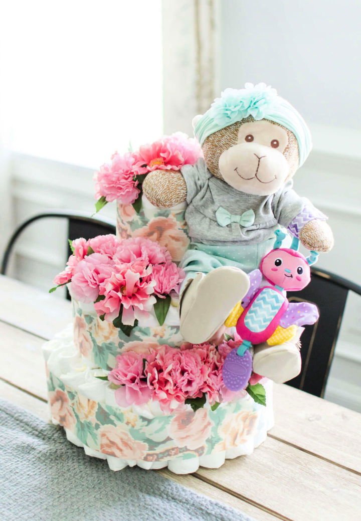 DIY Diaper Cake Ideas: 30 Easy Baby Shower Gift Guide 26 DIY Pink Floral Diaper Cake