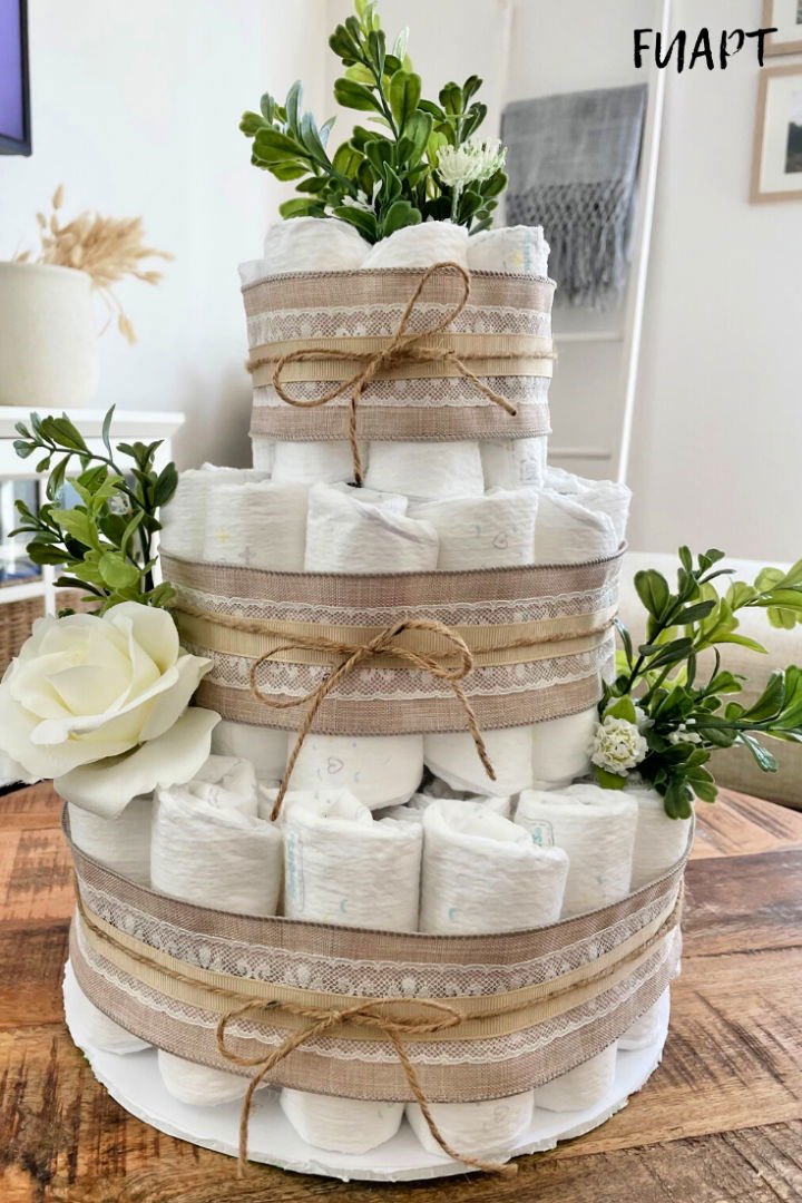 DIY Diaper Cake Ideas: 30 Easy Baby Shower Gift Guide 7 DIY Diaper Cake With a Bottle of Wine Inside