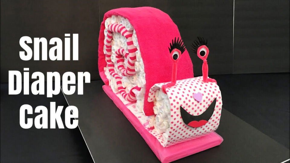 DIY Diaper Cake Ideas: 30 Easy Baby Shower Gift Guide 30 Making a Snail Diaper Cake
