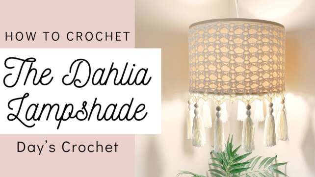 Close-up of a crocheted lampshade, showcasing the intricate stitch work and warm, inviting light it casts.