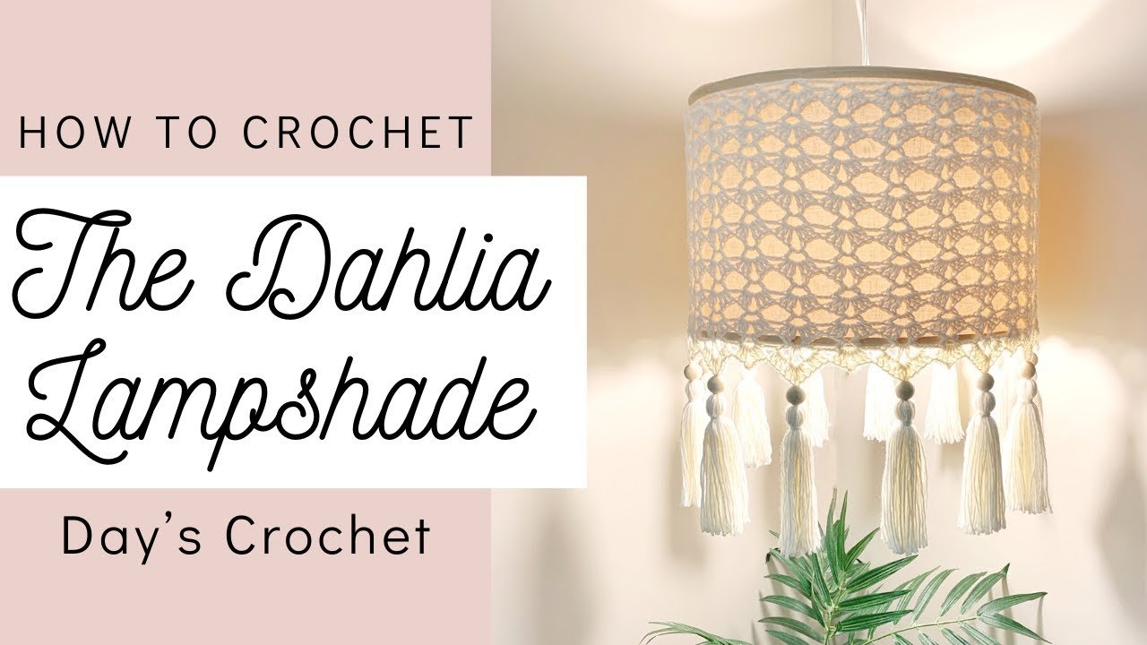 Close-up of a crocheted lampshade, showcasing the intricate stitch work and warm, inviting light it casts.