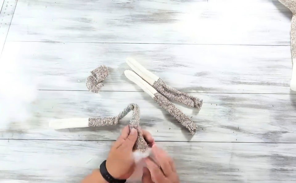 How to Make a Sock Monkey - A Step-by-Step Guide 5 cutting and sewing the arms, tail, and ears