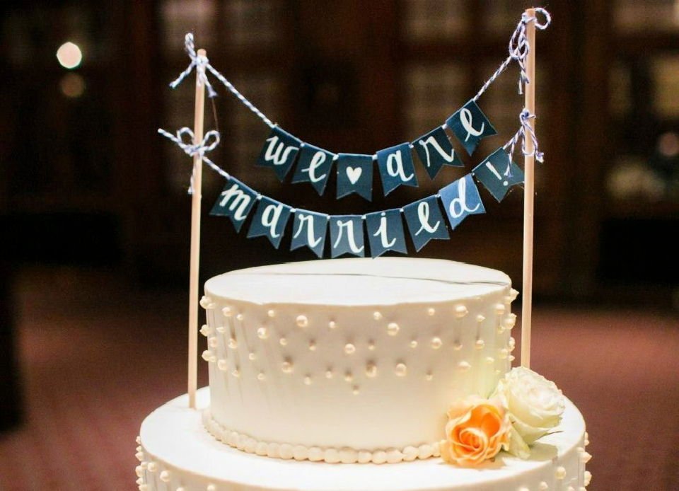 20 DIY Wedding Cake Topper Ideas You'll Love 12 How to Make a Paper Banner Wedding Cake Topper